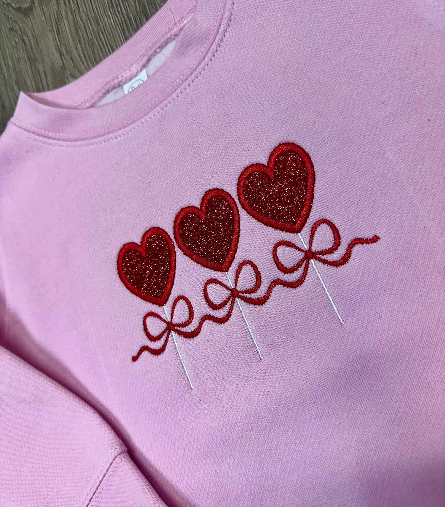 Embroidered Glitter Heart Sucker Sweatshirt